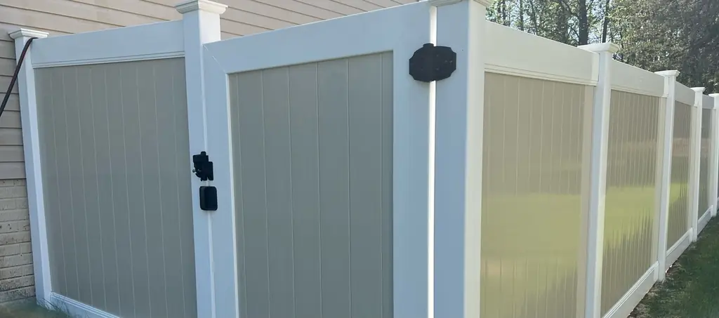 The same vinyl fence after washing